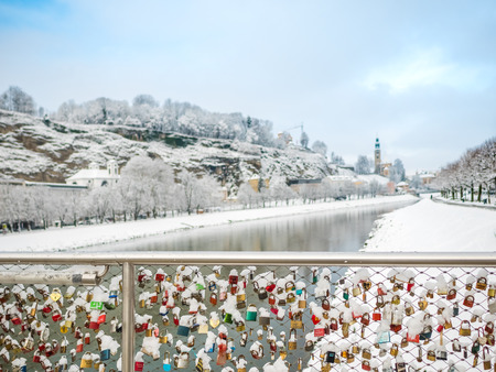 Feb 13 2018, Salzburg Austria, landscape snow winter season locked key of couple on the bridgeのeditorial素材