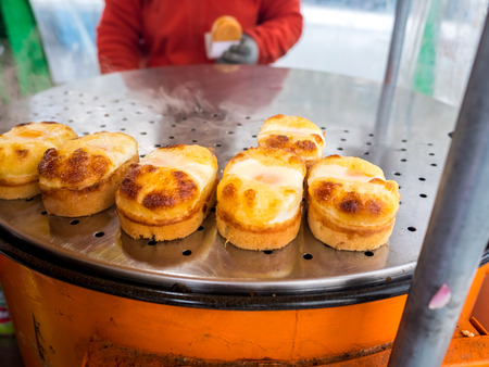 Egg bread Korean street food snack, egg cake,cheese also known as gyeran-ppang, found in Seoul, South Koreaの写真素材
