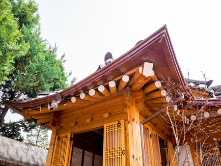 Traditional Korean wall style and historical house symbol architecture at Bukchon Hanok Village in Seoul, South Korea.の写真素材