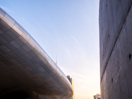 Seoul, South Korea - April 16, 2018: People and touristor visits Dongdaemun Design Plaza (DDP). The newest and most iconic landmark of the Korean design industry with modern interior curve shape architectureのeditorial素材