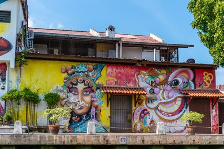 MELAKA, MALAYSIA -DECEMBER 30,2018: Street art on buildings along the Melaka river. Malacca, dubbed Historic State historical city centre Colorful painting of the houses along Melaka river.のeditorial素材