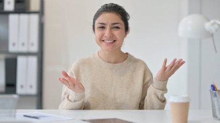 Excited Indian Woman Talking on Video Chatの写真素材