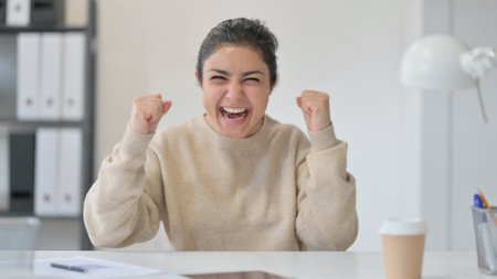 Young Indian Woman Celebrating Success, Winningの写真素材