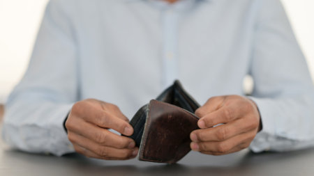 Hands of African Man Checking Empty Wallet, Close upの写真素材