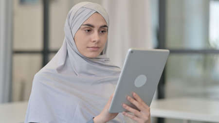 Young Arab Woman using Digital Tabletの写真素材