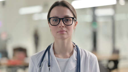 Portrait of Young Female Doctor Looking at Cameraの写真素材