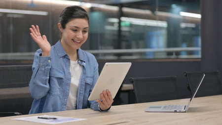 Indian Woman at Work Doing Video Chat