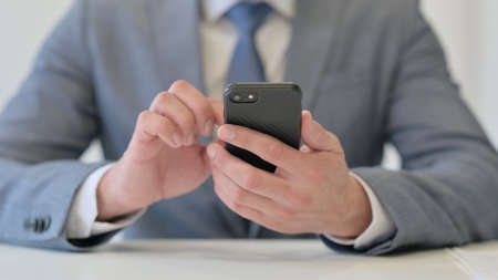 Close Up of Businessman using Smartphone, Mobileの写真素材