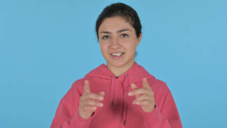 Vlogging Indian Girl Talking Online, Blue Background