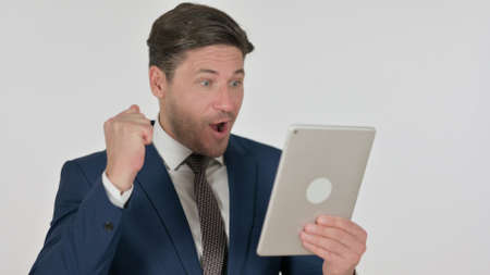 Middle Aged Businessman having Loss on Tablet, White Backgroundの写真素材