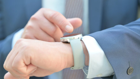 Close up of Businessman Using Smartwatch