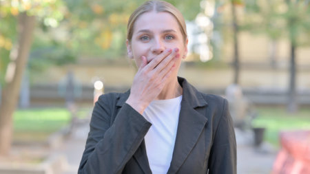 Outdoor Portrait of Astonished Businesswoman Wondering in Awe, Feeling Surprised
