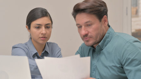 Close Up of Multi Ethnic People Discussing Project