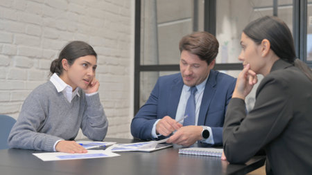 Angry Indian Businesswoman Having Argument with Colleagues