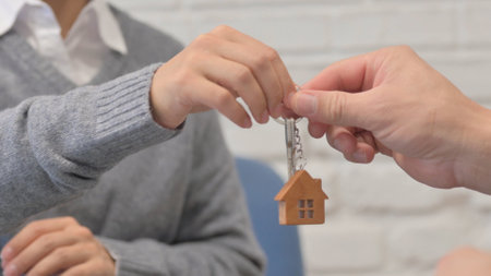 Close up of Giving Home Keysの写真素材