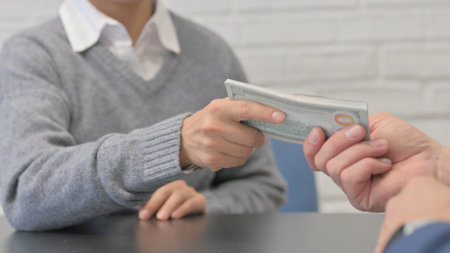Close Up of Female Giving Money