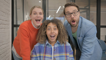Portrait of Mixed Race People Celebrating Success