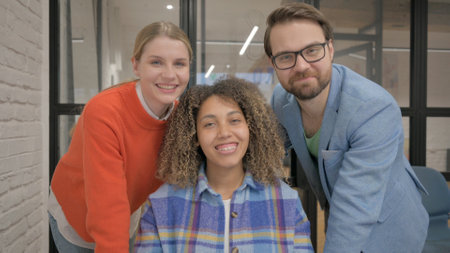 Mixed Race People Doing Video Chat in Officeの写真素材