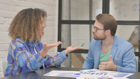 Multi Ethnic People in Argument at Work