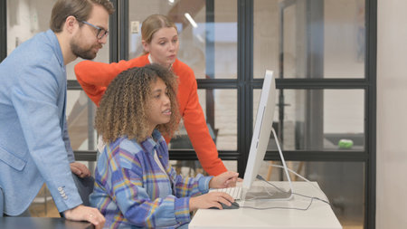 Multiethnic People Working on Computerの写真素材