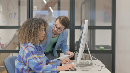 Man Talking with Woman at Work