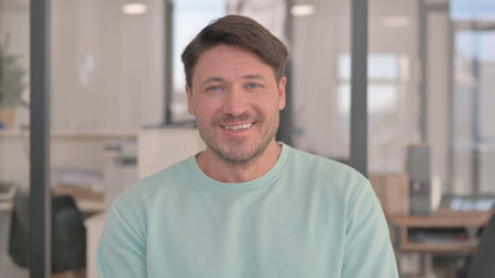 Portrait of Smiling Middle Aged Manの写真素材