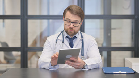 Doctor Using Digital Tablet in Hospitalの写真素材