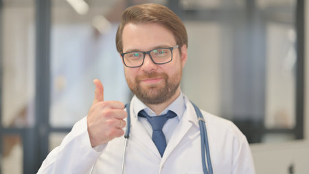 Portrait of Doctor with Thumbs Upの写真素材