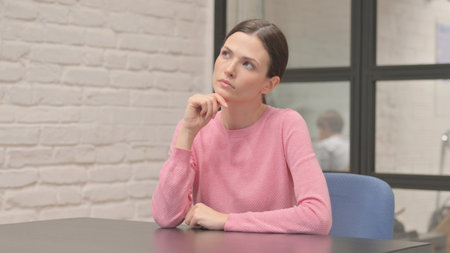 Pensive Woman Brainstorming New Business Project