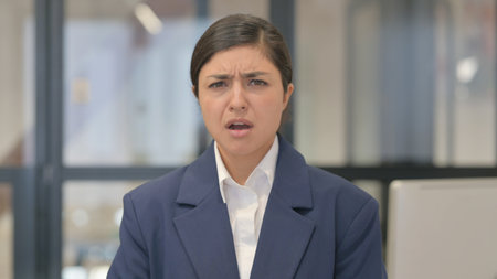 Unhappy Indian Businesswoman Criticizing to Failureの写真素材