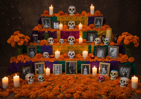 Day of the Dead altar with skulls, flowers and candles on dark backgroundの素材