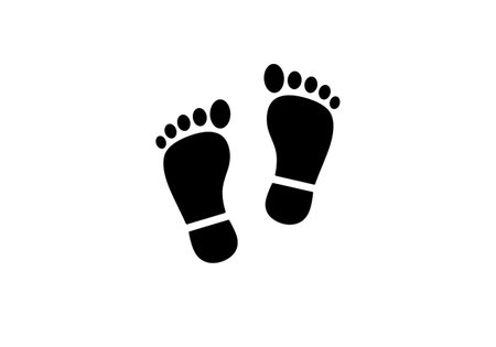 Foot print icon isolated on white background. Footprint vector icon.の素材