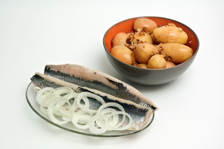 herring with onions and boiled potatoes.の写真素材