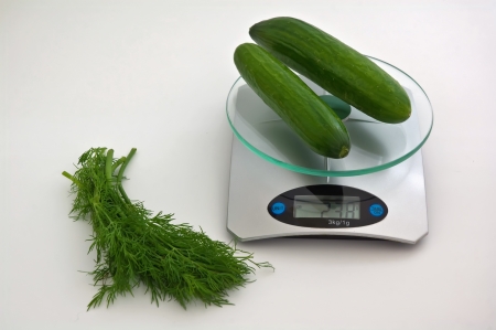 weighing ingredients for cooking delicious, diet dishes.の写真素材