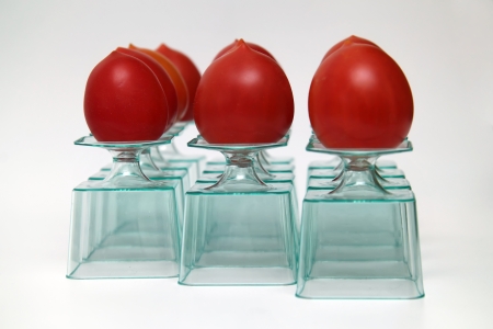 exercises with disposable dishes on a white background, with vegetables and fruit juices.