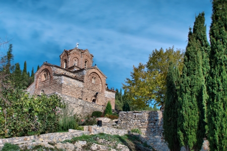 old ancient church St  John   Jovan Kaneo lower view at lake Ohrid, Macedonia between the treesの写真素材
