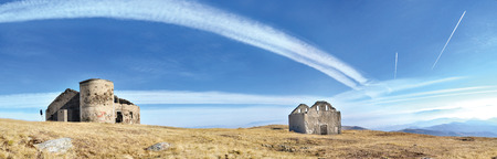 Mountain top panorama, Panorama from the mountain top with the plane trailsの写真素材