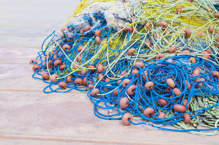 fishing net details on boat  A fishing net that holds promise of catching the big haul の写真素材