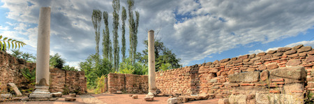 lower view of Ancient Roman Cardo street  Trst via Ignacia and antic old II century church basilica posts and stone wallsの写真素材