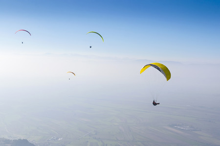 paraglider extreme adrenaline sport fly. Aerial povの写真素材