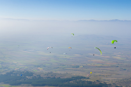 paragliding gliding extreme sport adrenaline activityの写真素材