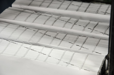 Book offset print production line in pringint shopの写真素材