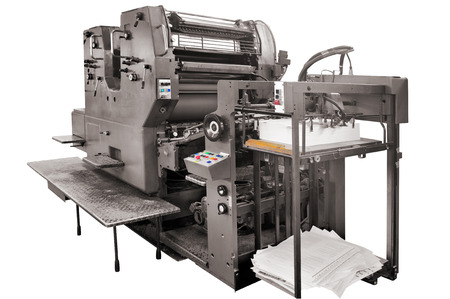 old offset printing press isolated on white, clipping path includedの写真素材