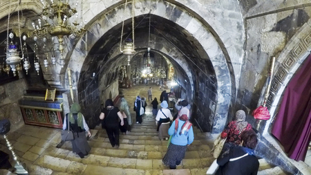JERUSALEM, ISRAEL - 26 JUNE 2016: people enter in the temple Maria grotto, handheld shotのeditorial素材
