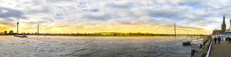 Panoramic view of Sunset of Rhein river at Dusseldorf - Urban Skyline, Bridge - Built Structure, City, Rhine River, Capital Citiesのeditorial素材
