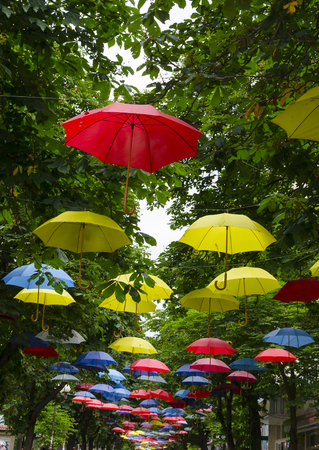 Street decorated with colored umbrellasの写真素材