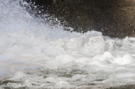 Clear, splashing water foam formsの写真素材