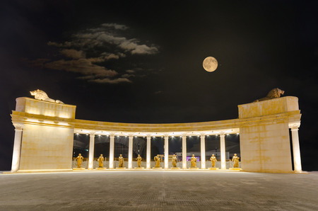 Panoramic view of square Mother Theresa in Skopje, Macedonia at night with dramatic sky and moonのeditorial素材