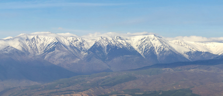 Panorama of snowy mountain peaks rangeの写真素材