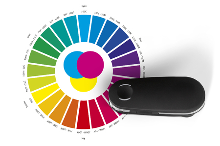 Print color wheel and spectrometer controll instrument reading RGB, CMYK, LAB valuesの写真素材